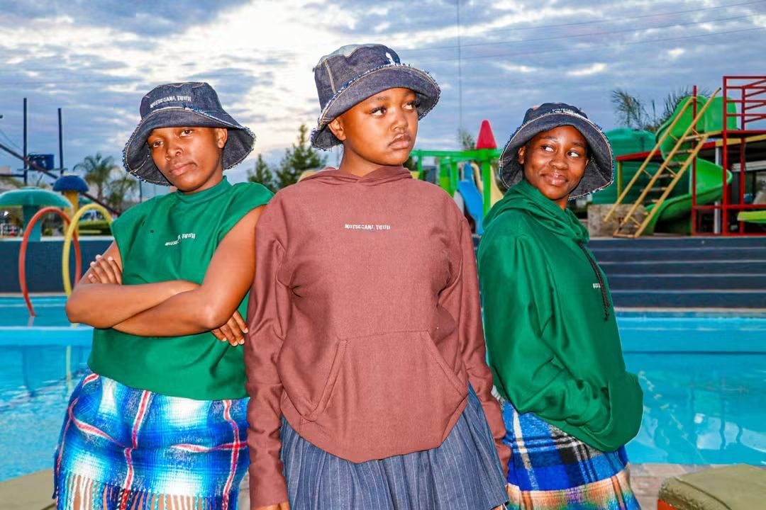 Group portrait from a Bars Graphics shoot at a pool venue